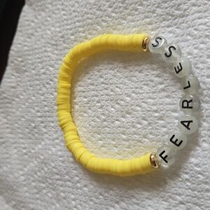 Yellow fearless bracelet